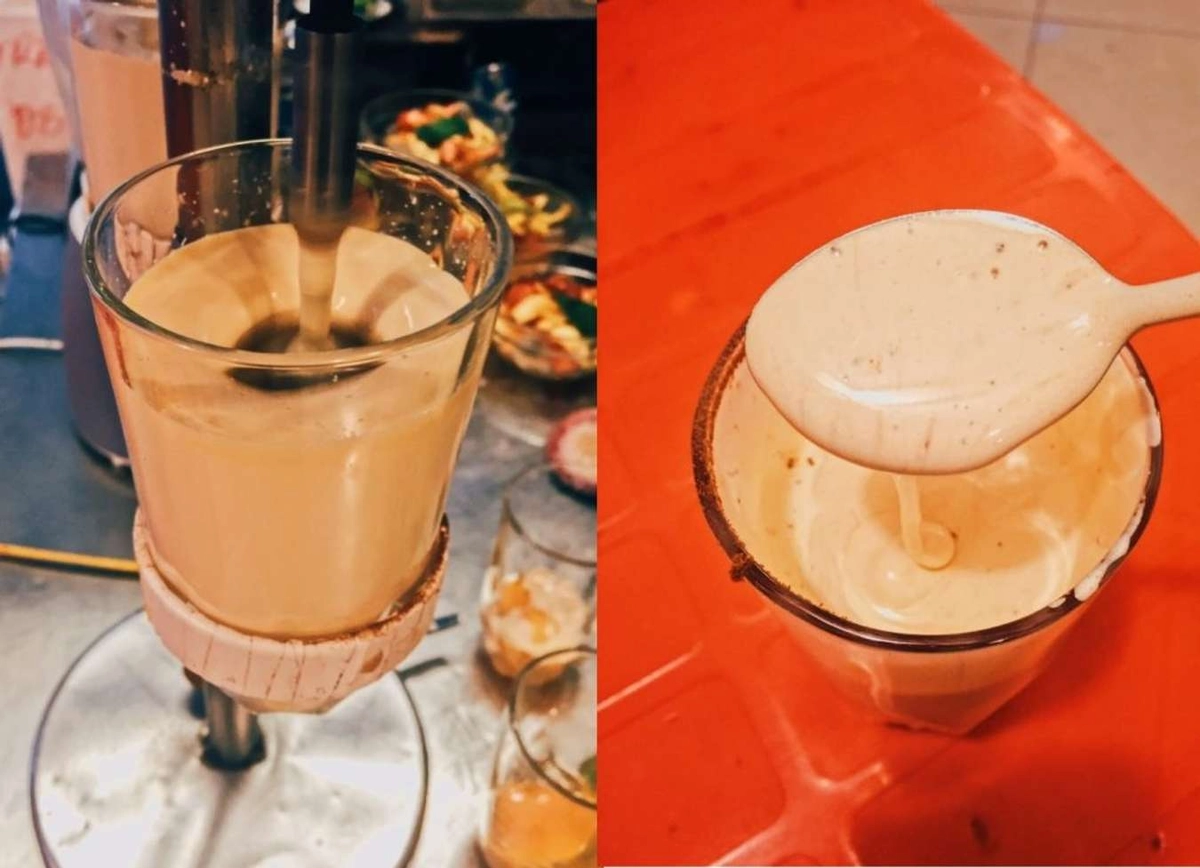 ly cà phê trứng sánh mịn rắc bột cacao